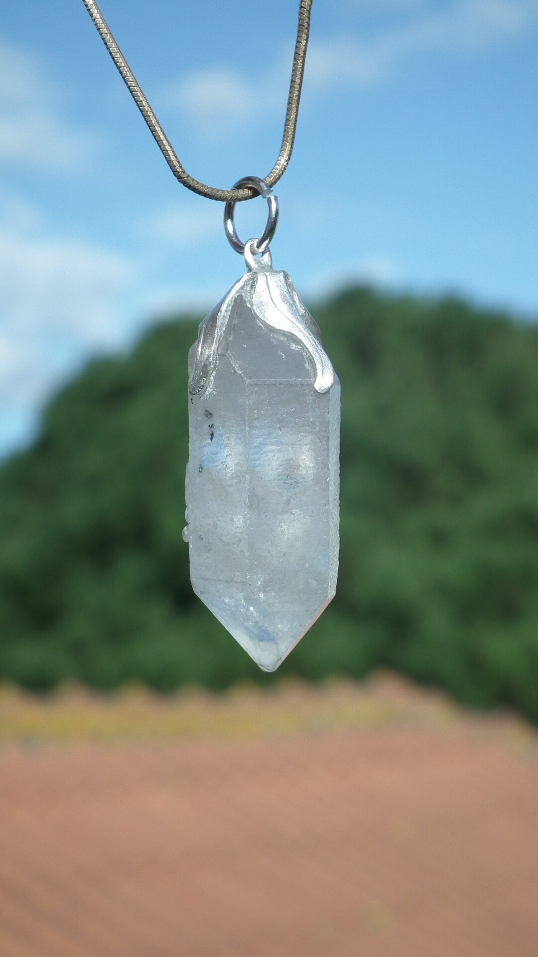 Double terminated Quartz pendant