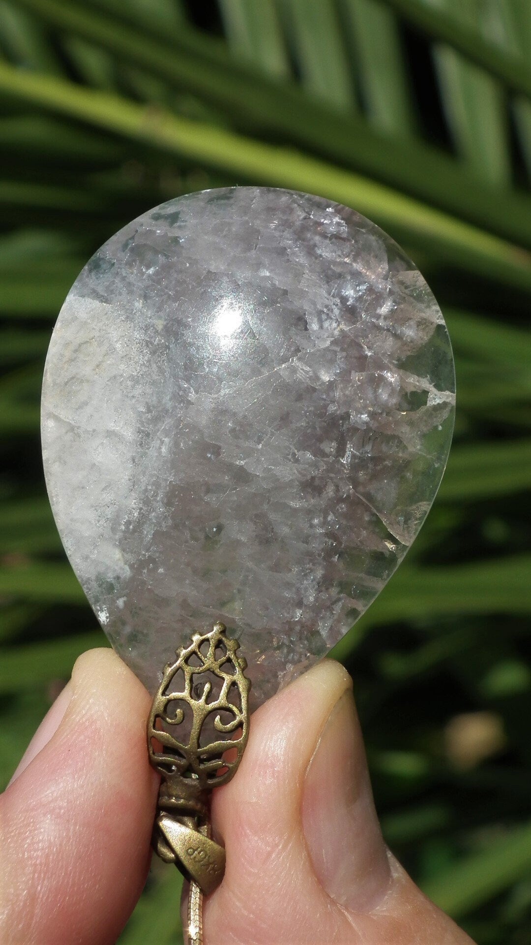 Fluorite pendant with bronze bail