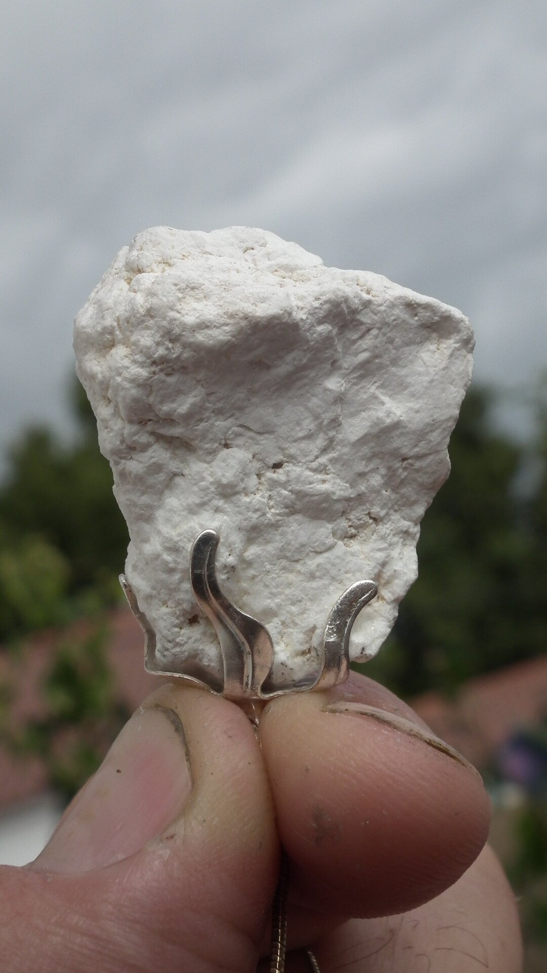 Natural rough magnesite pendant with silverplated bail