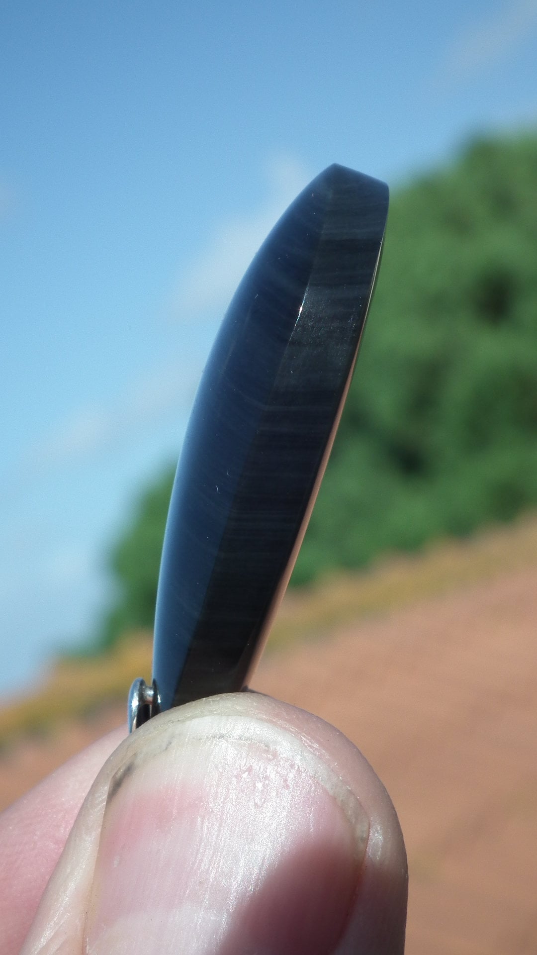 Rainbow obsidian pendant with sterling silver bail