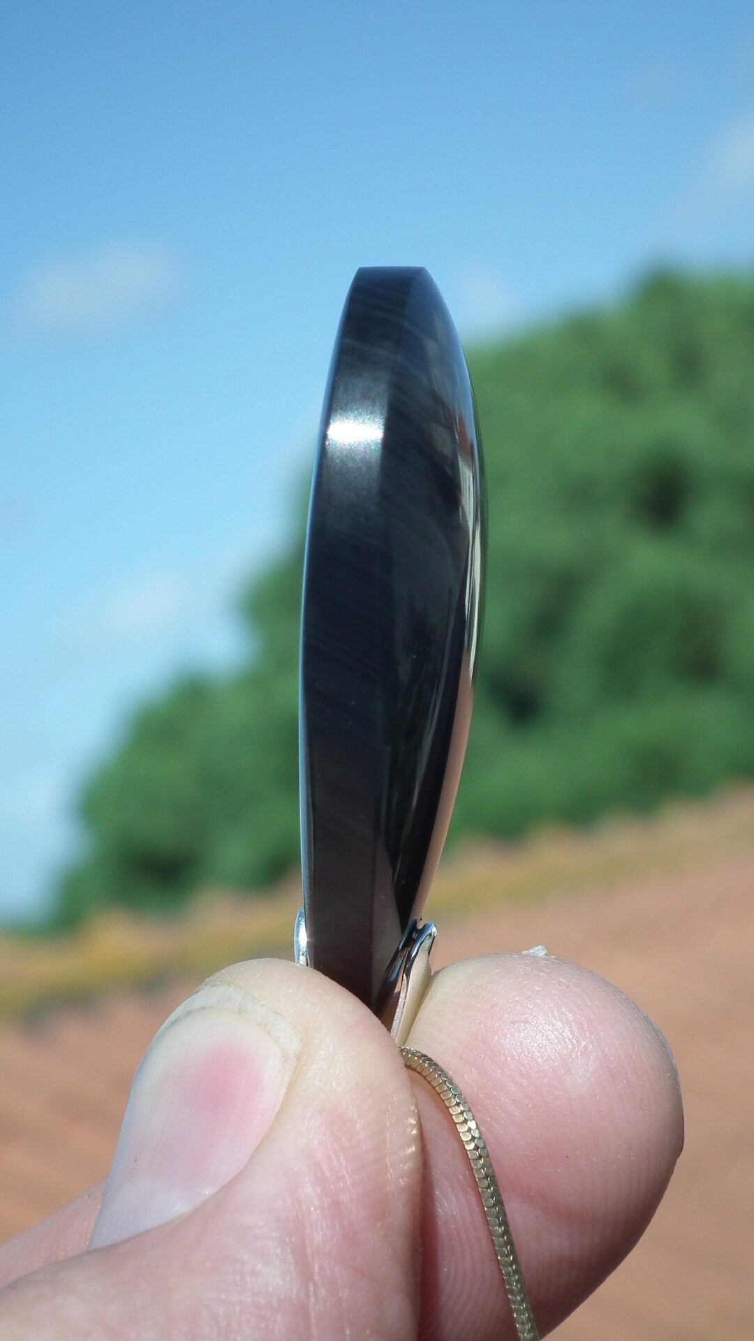 Rainbow obsidian pendant with sterling silver bail