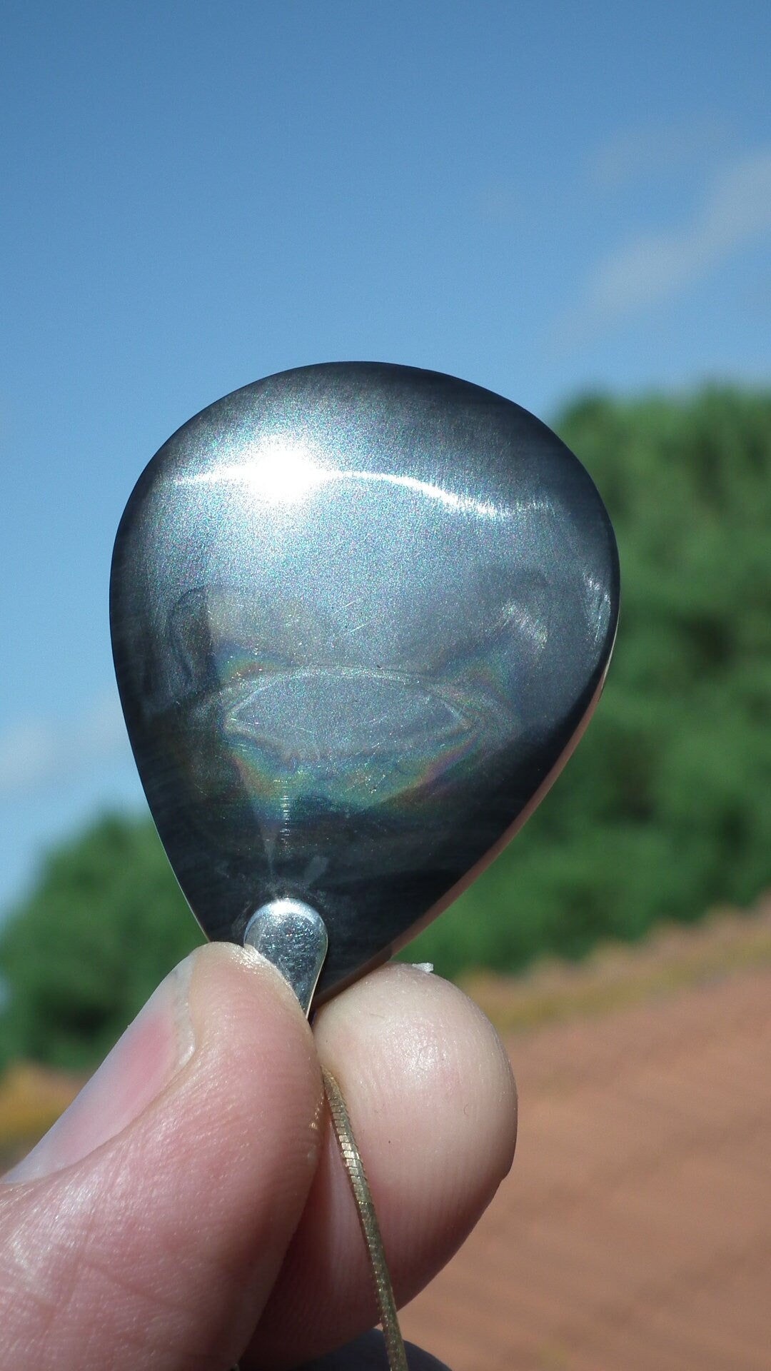 Rainbow obsidian pendant with sterling silver bail