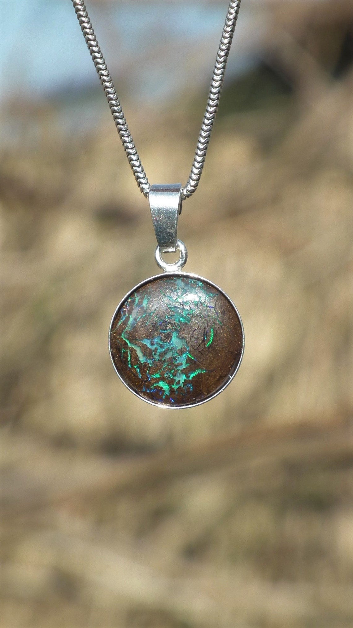 Australian boulder opal necklace in sterling silver setting