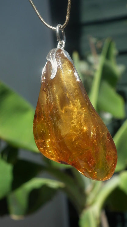 Baltic amber / bernstein pendant with silverplated bel cap