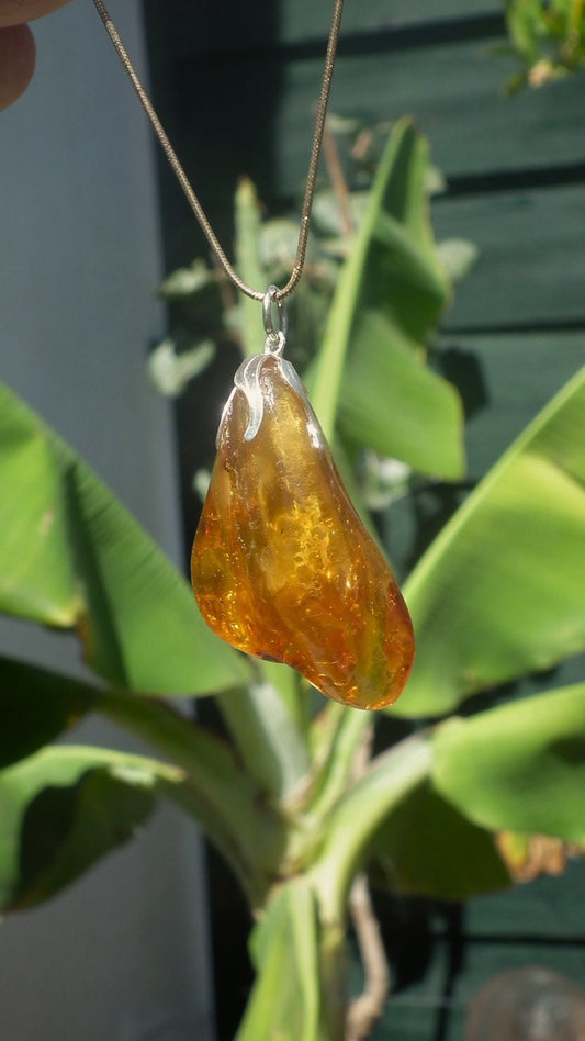 Baltic amber / bernstein pendant with silverplated bel cap