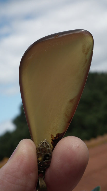 Sumatra amber pendant with bronze bail