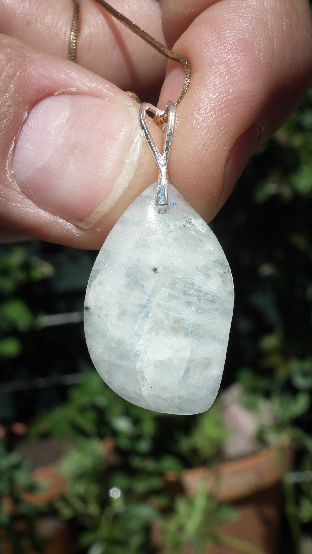 Rainbow moonstone pendant with sterling silver bail