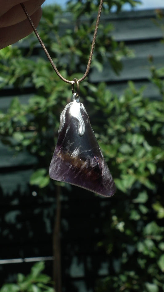 Super 7 pendant with silverplated bail, Amethyst cacoxenite
