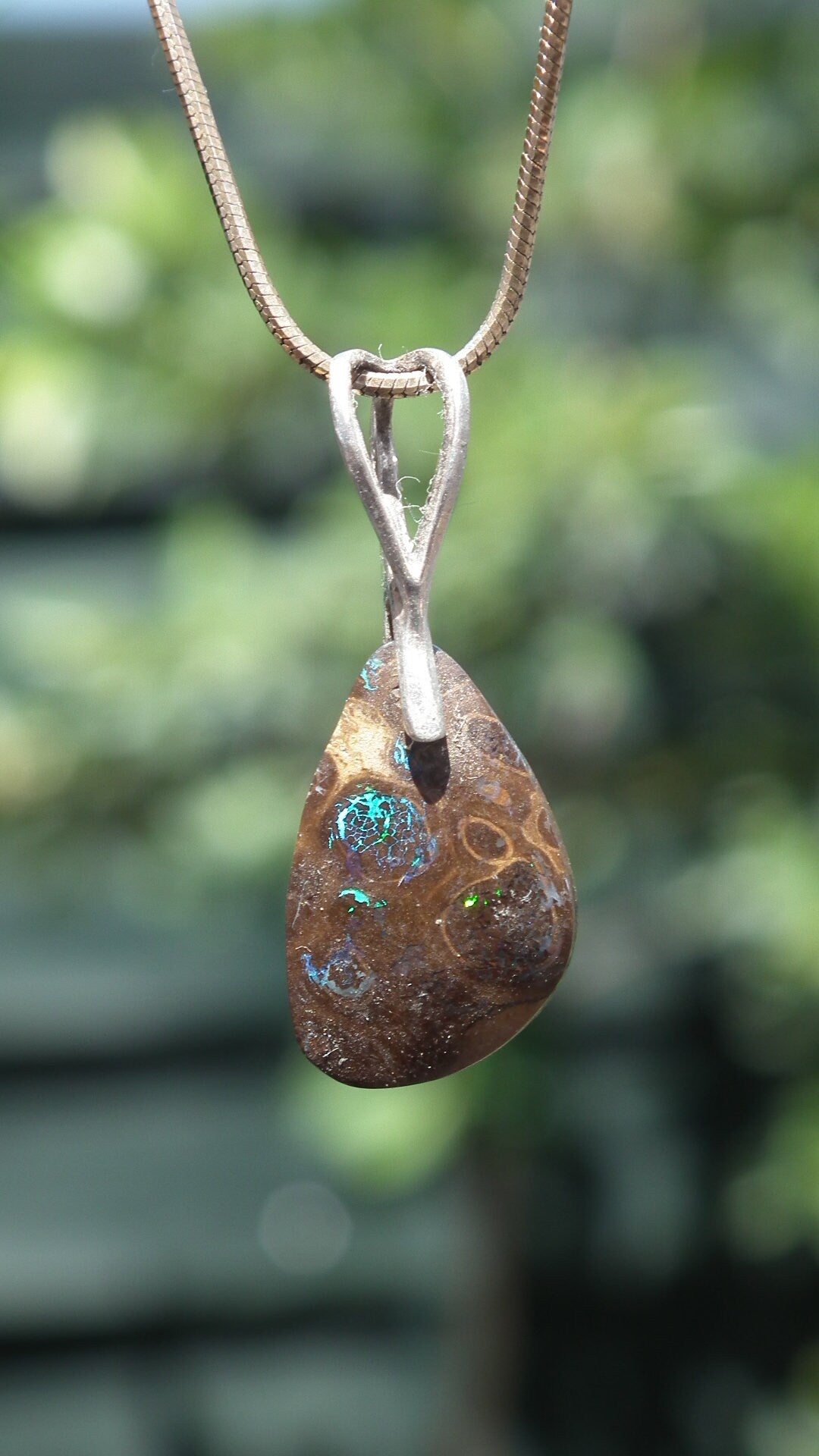 Boulder opal pendant with sterling silver bail