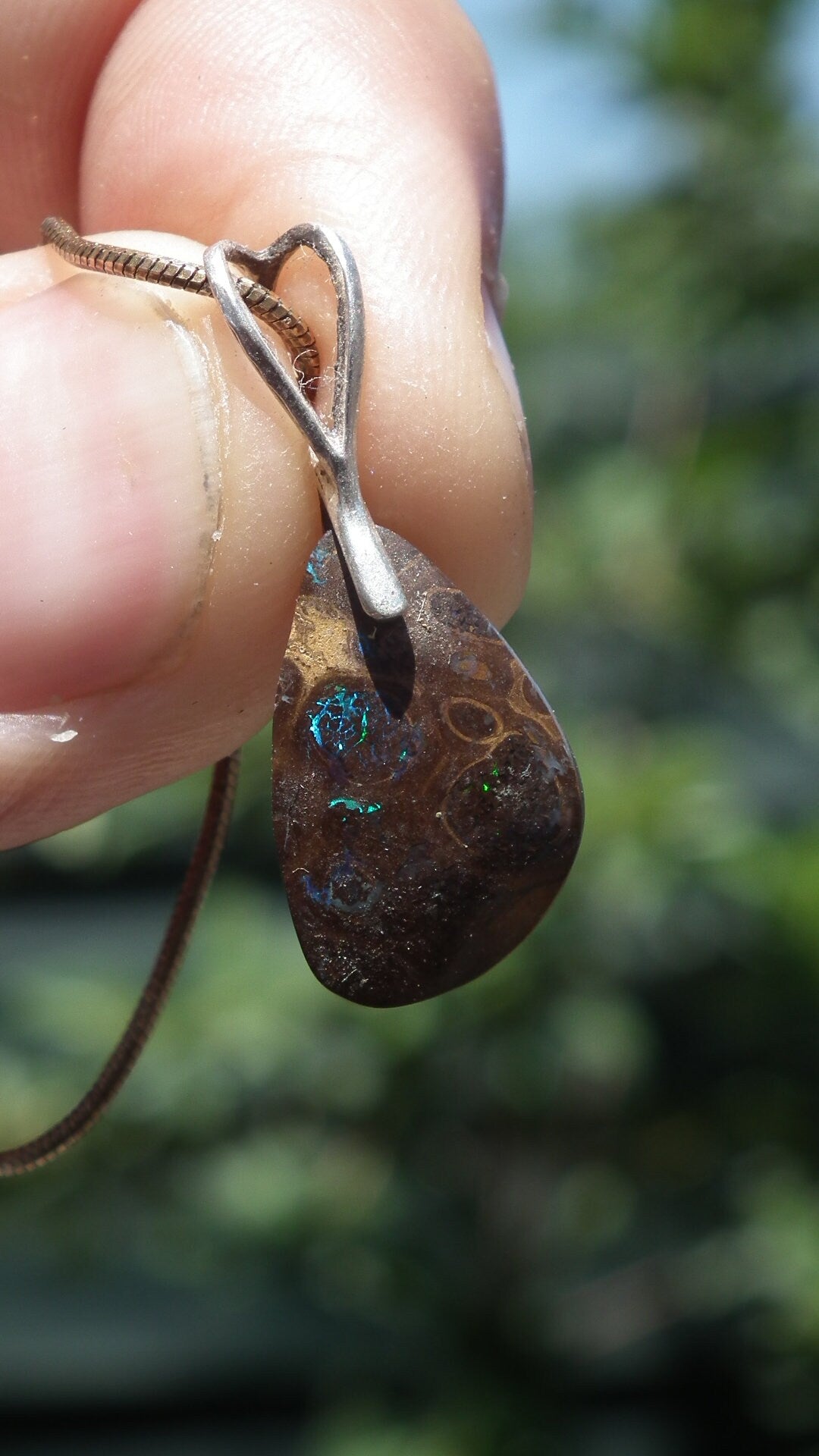 Boulder opal pendant with sterling silver bail