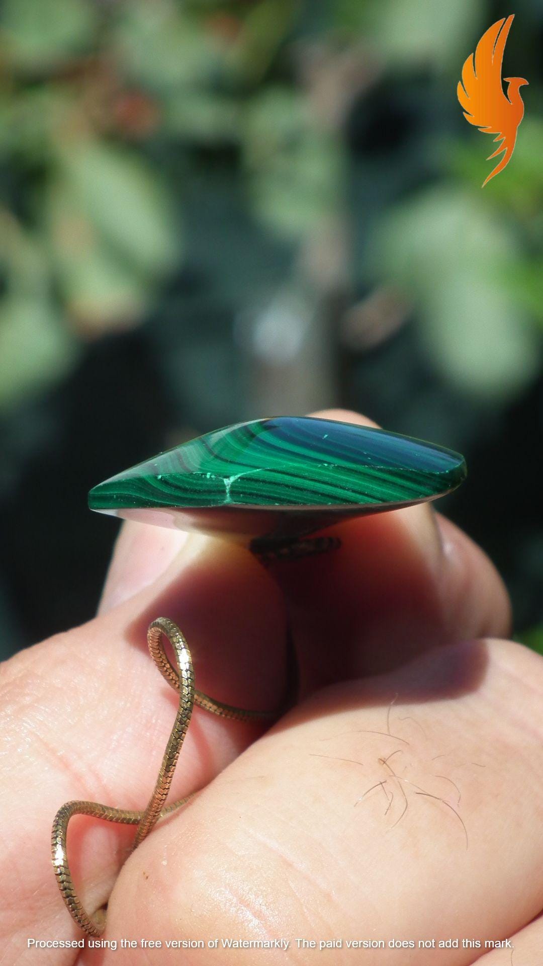 Malachite pendant with bronze bail