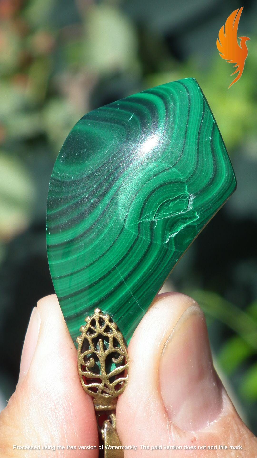 Malachite pendant with bronze bail