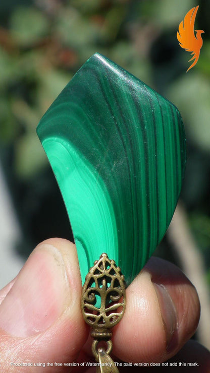 Malachite pendant with bronze bail