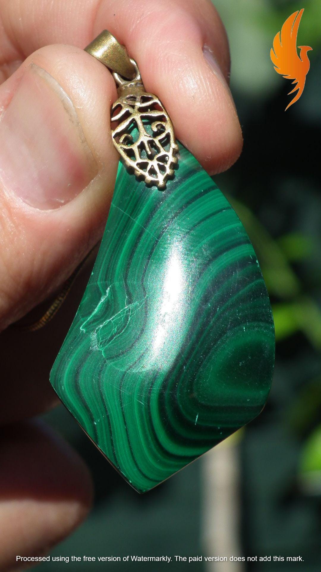 Malachite pendant with bronze bail