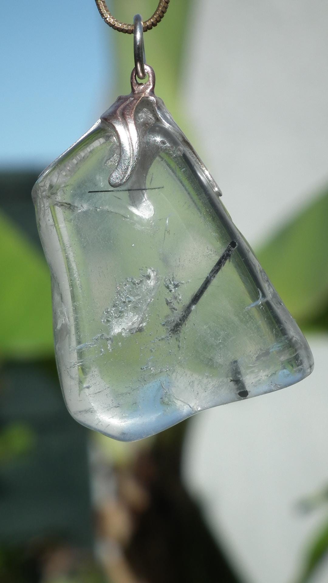 Rutilated quartz pendant silver plated bail