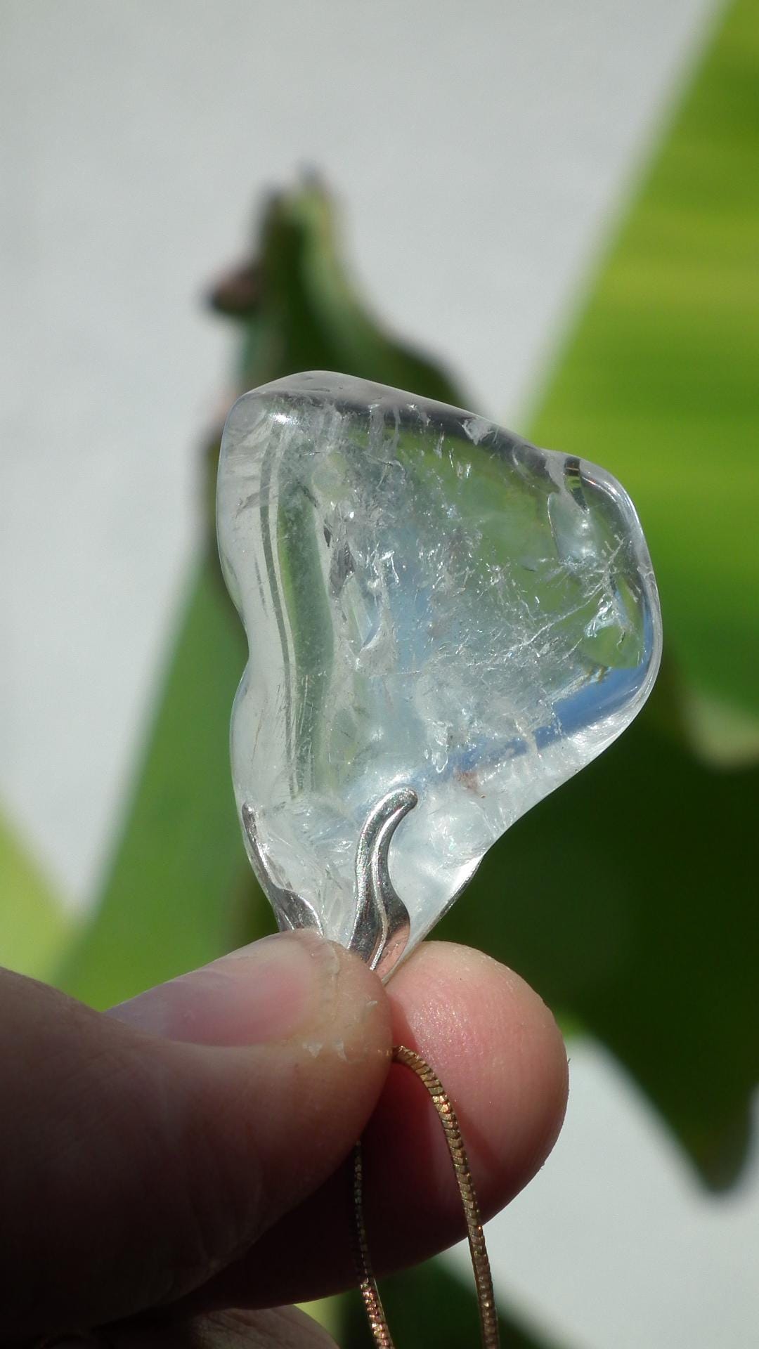 Clear quartz necklace with adjustable wax cord