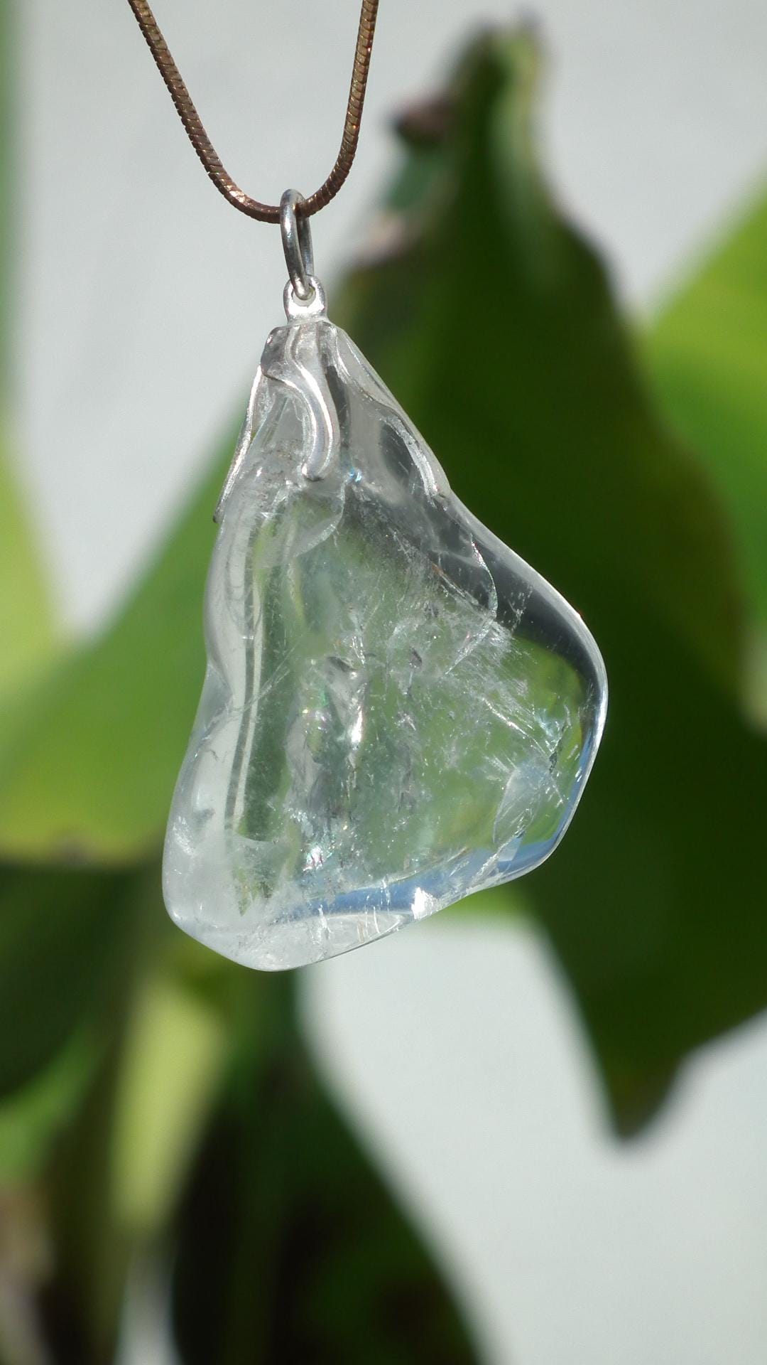 Clear quartz necklace with adjustable wax cord