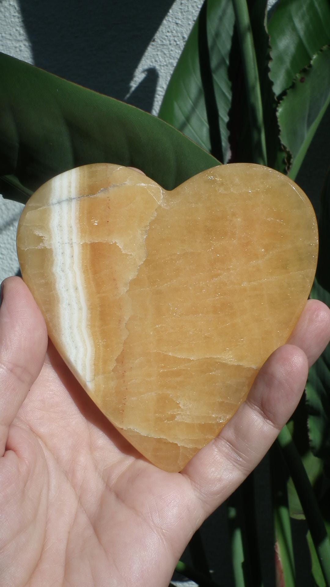 Handmade orange calcite heart