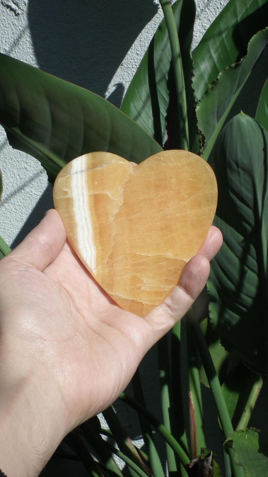 Handmade orange calcite heart