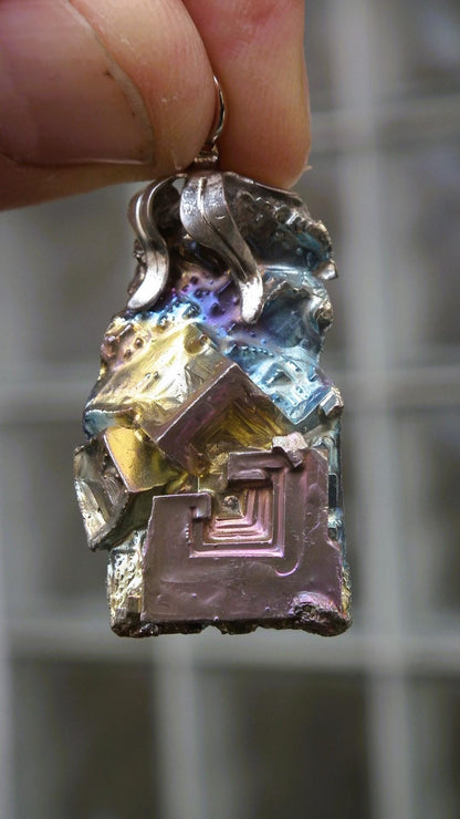 Bismuth pendant with silverplated bail, bismuth crystal