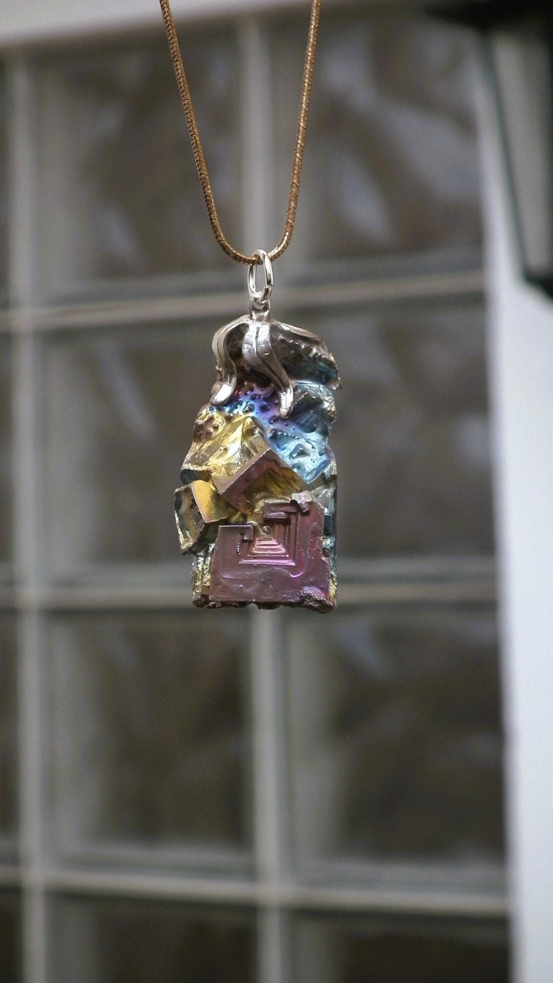 Bismuth pendant with silverplated bail, bismuth crystal