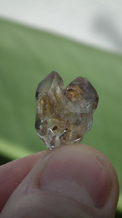 Uv reactive crystal pendant // Petroleum quartz // Terminated quartz