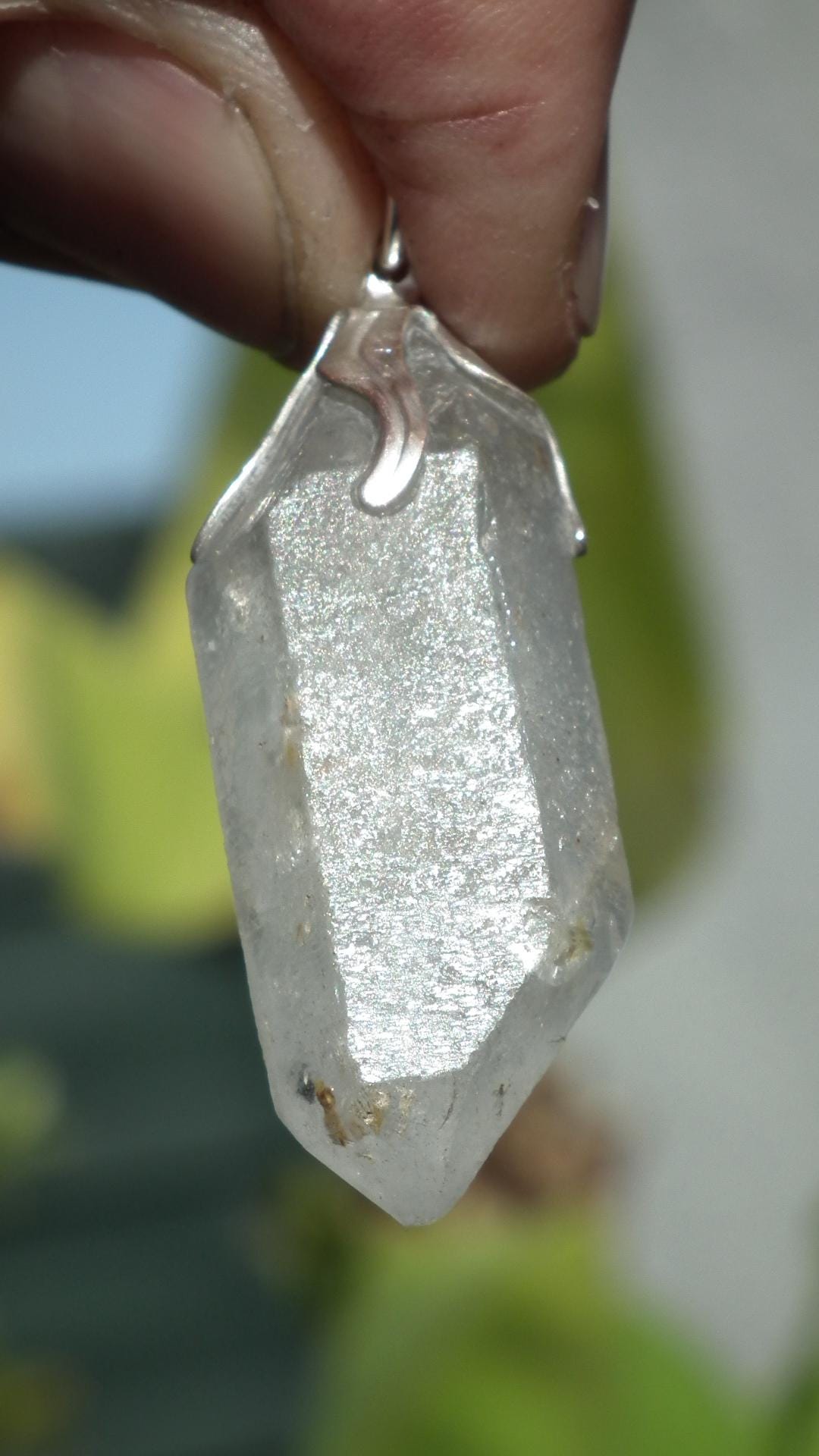 Double terminated Quartz pendant