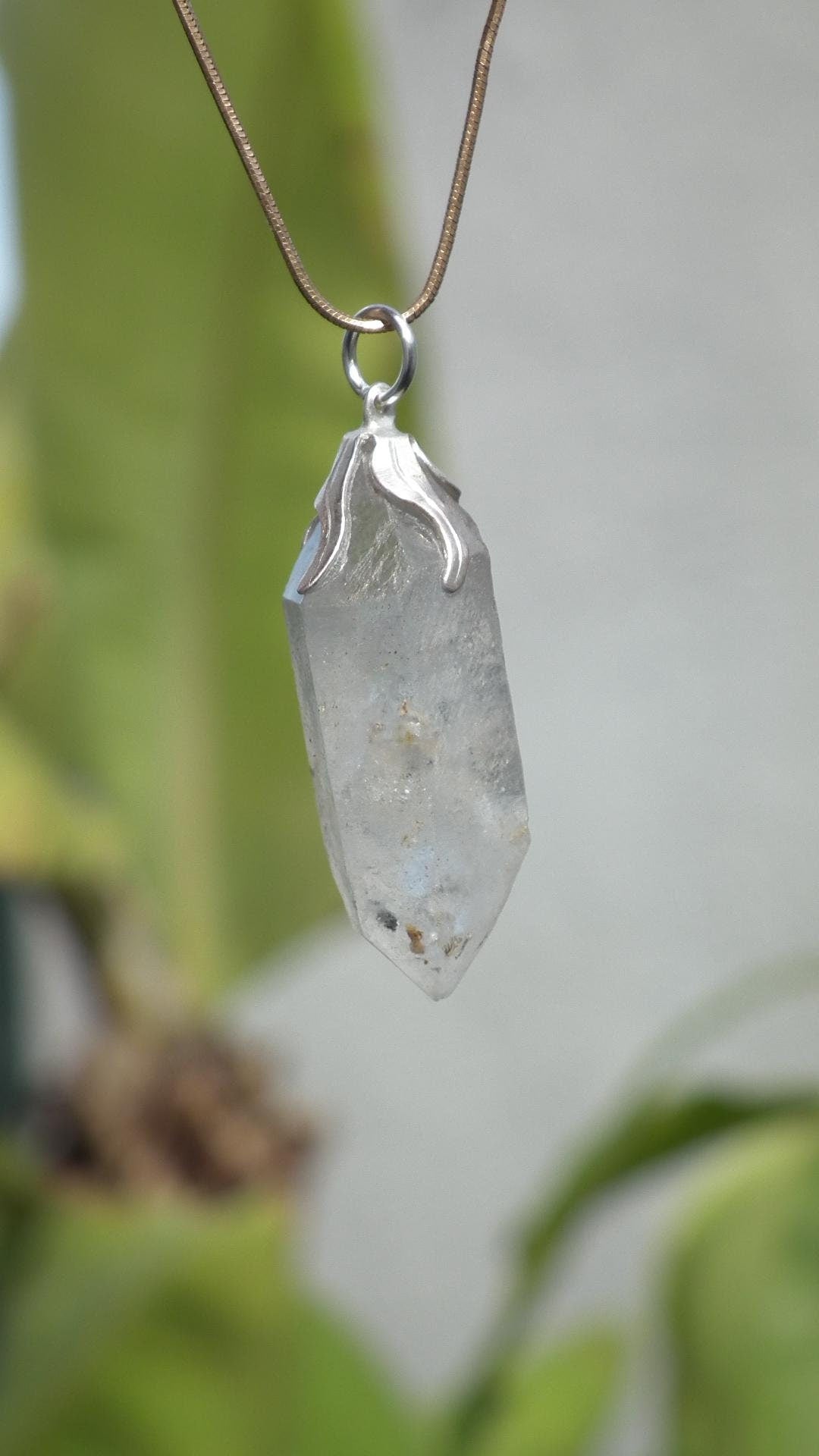 Double terminated Quartz pendant