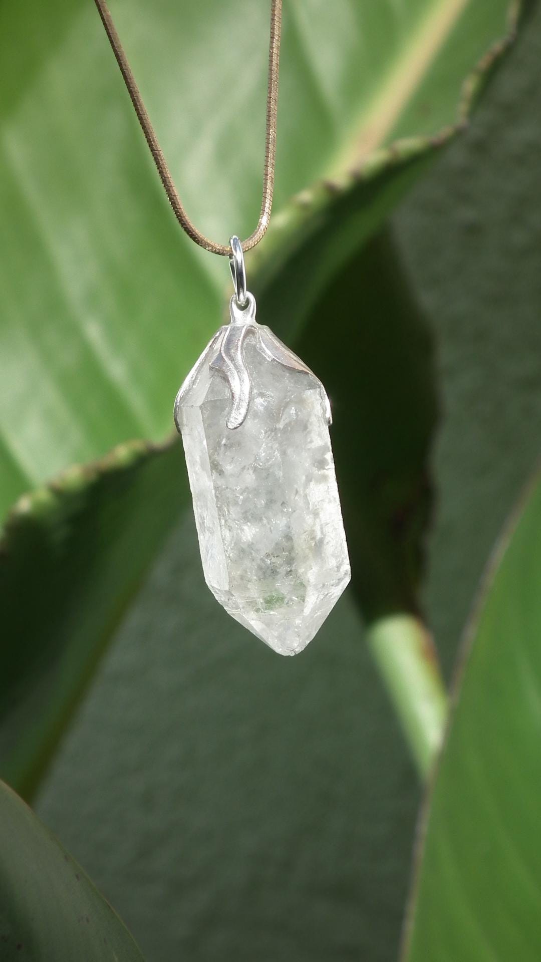 Double terminated Quartz pendant