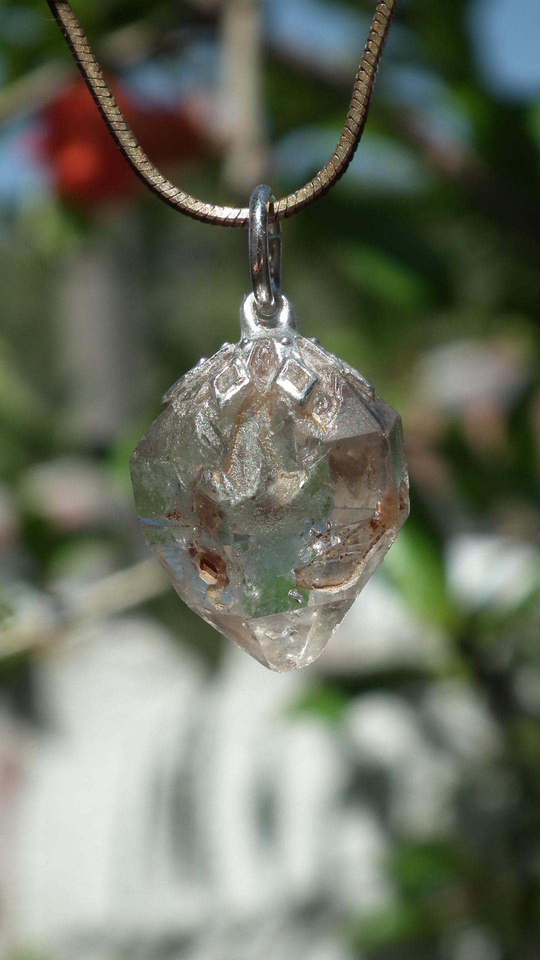 Uv reactive crystal pendant // Petroleum quartz // Terminated quartz