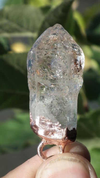 Uv reactive crystal pendant // Petroleum quartz // Terminated quartz