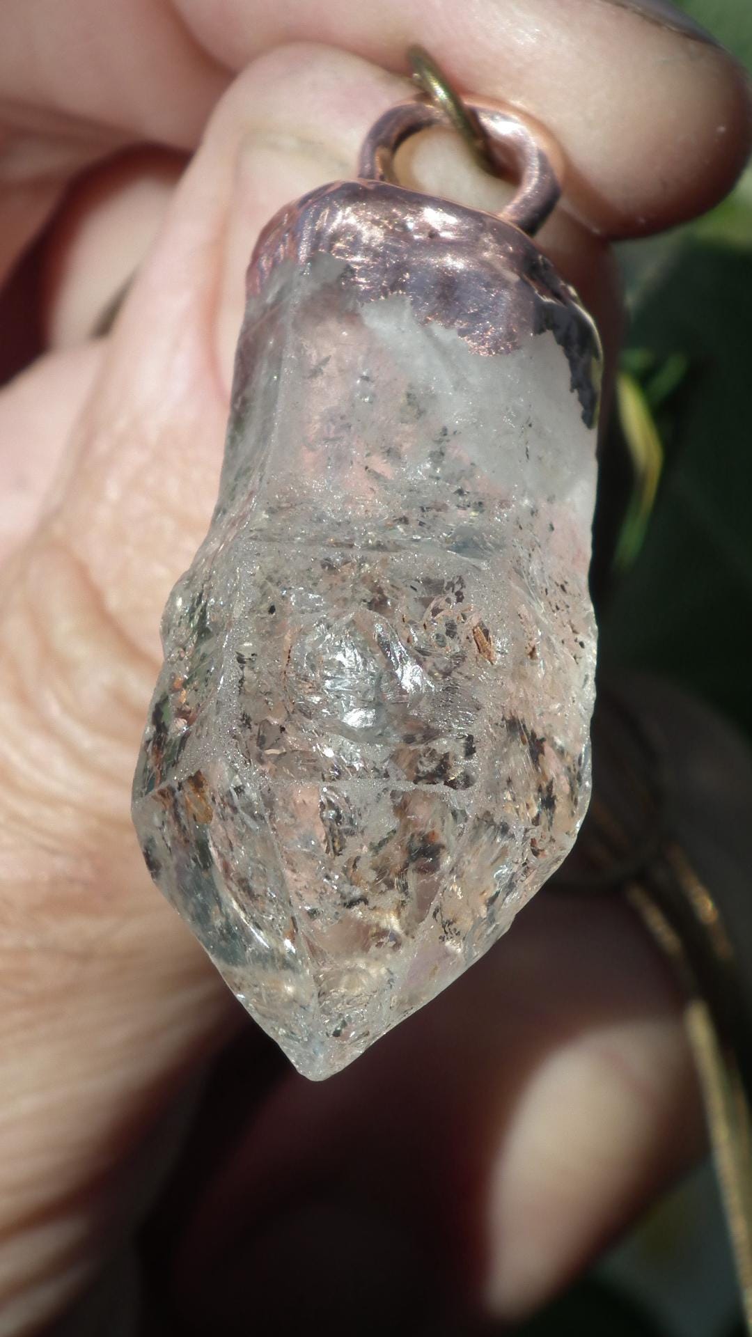 Uv reactive crystal pendant // Petroleum quartz // Terminated quartz