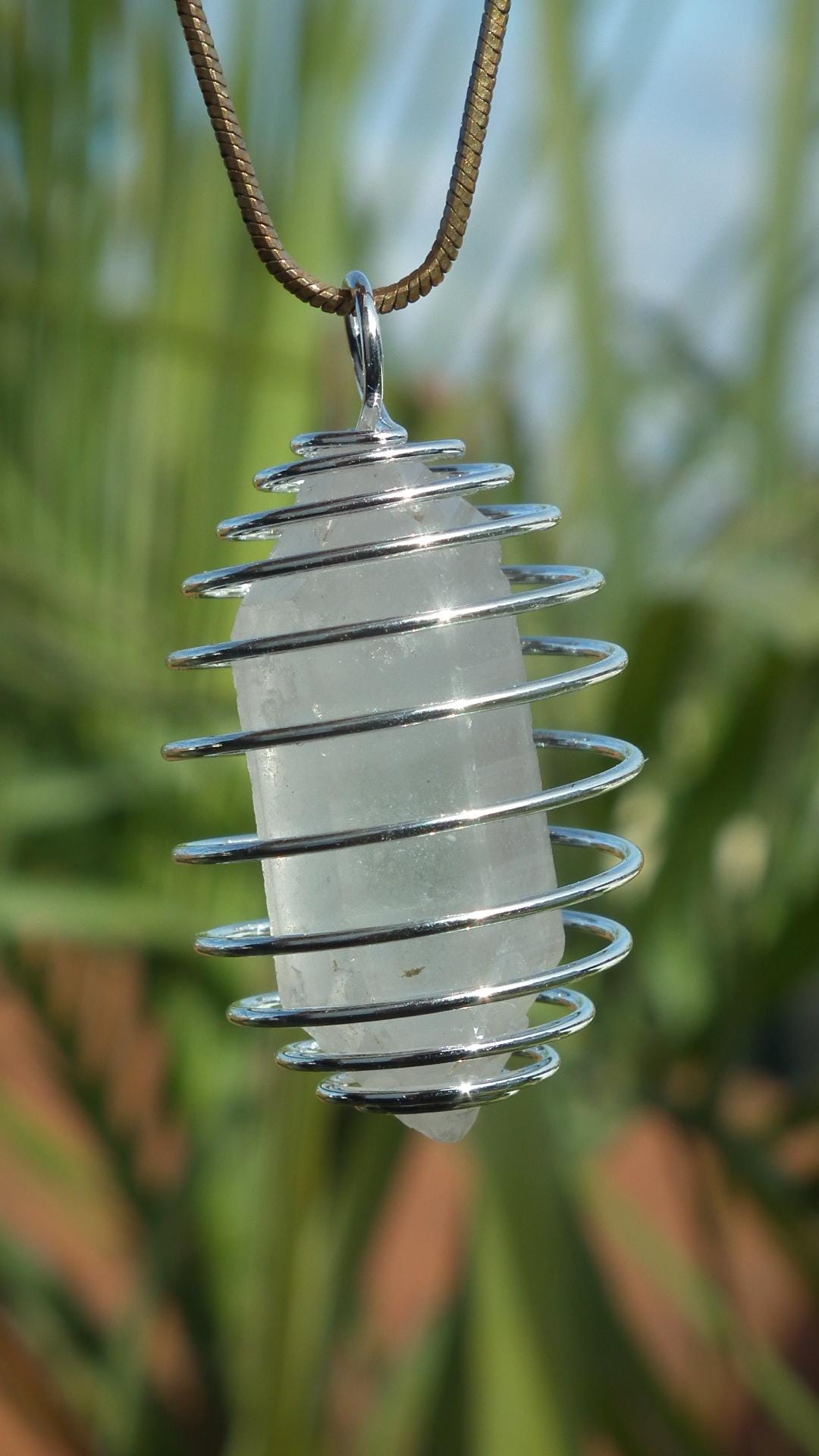 Double terminated Quartz pendant