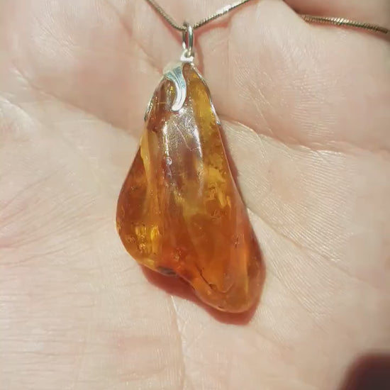 Baltic amber / bernstein pendant with silverplated bel cap