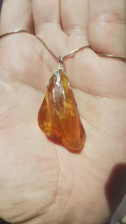 Baltic amber / bernstein pendant with silverplated bel cap