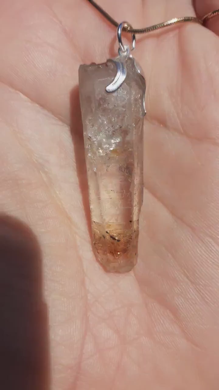 Uv reactive crystal pendant // Petroleum quartz // Terminated quartz