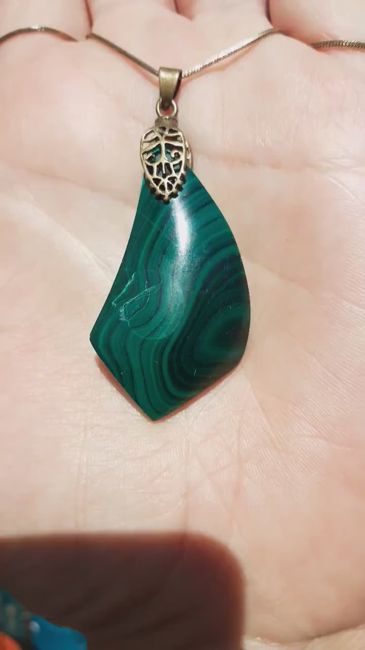 Malachite pendant with bronze bail