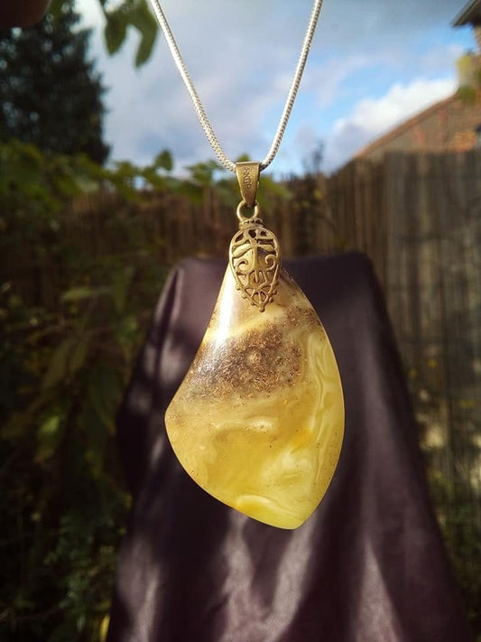 Baltic amber pendant with bronze bail