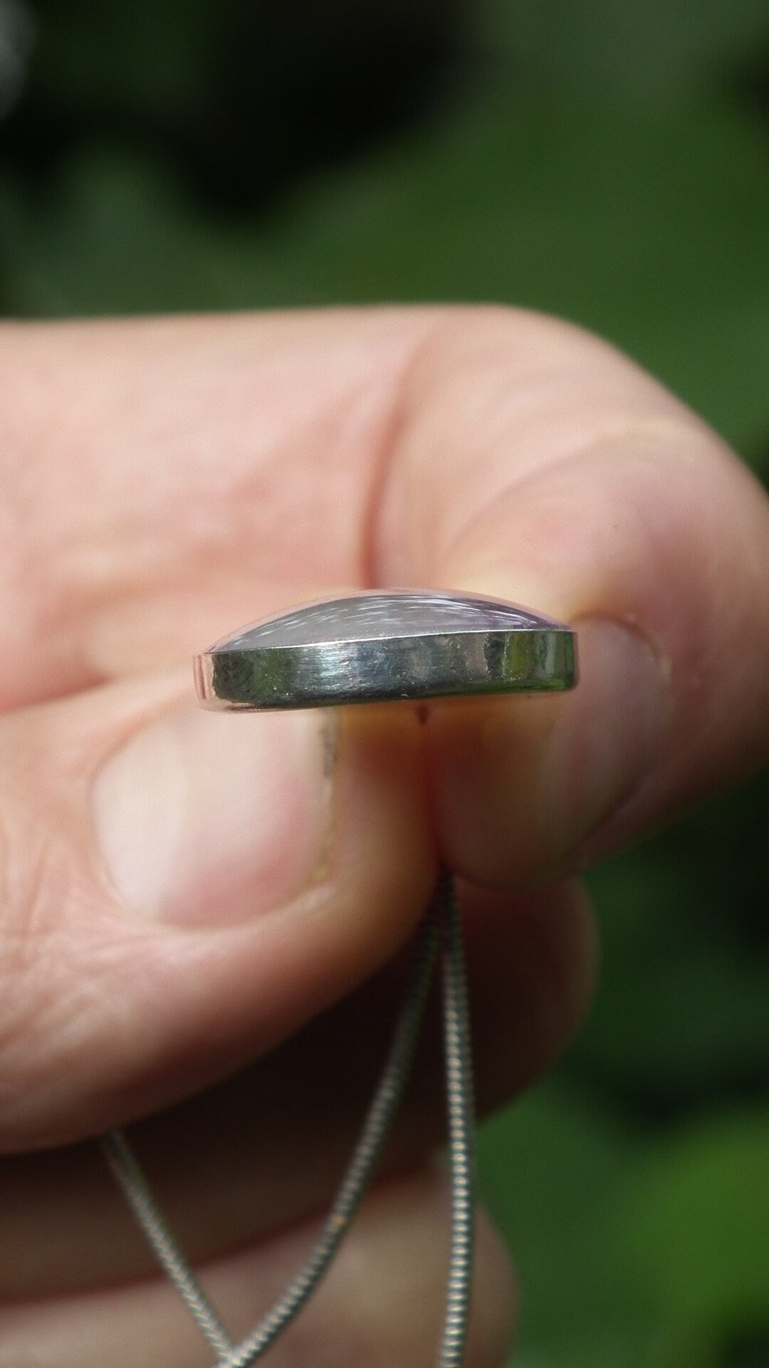 Fluorite pendant in sterling silver setting