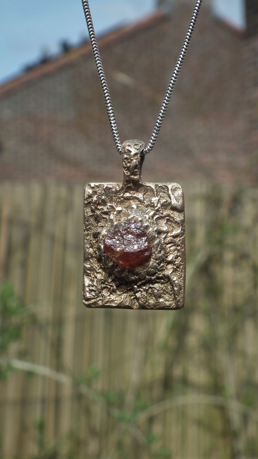 Handmade bronze Hessonite pendant