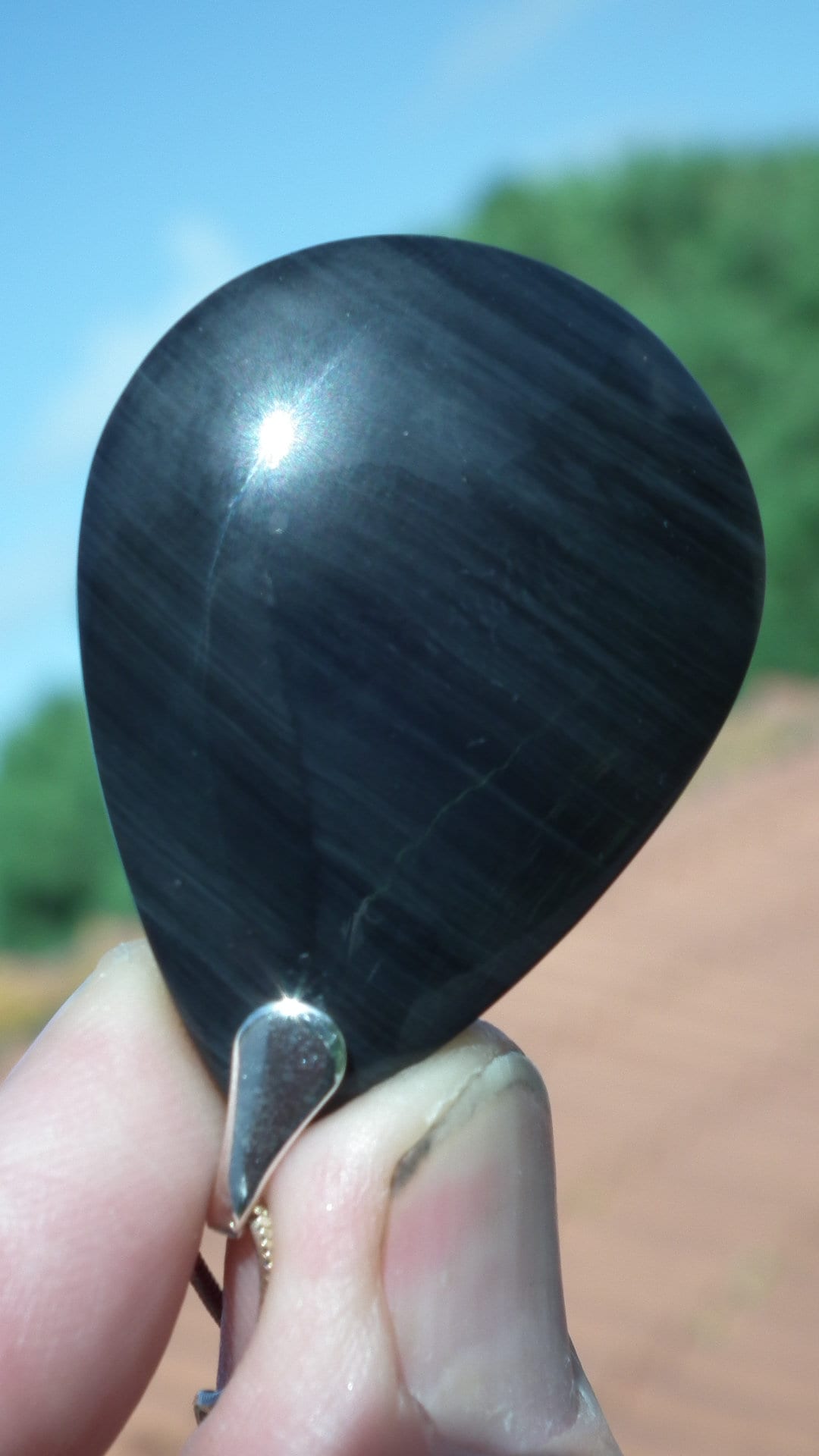 Rainbow obsidian pendant with sterling silver bail