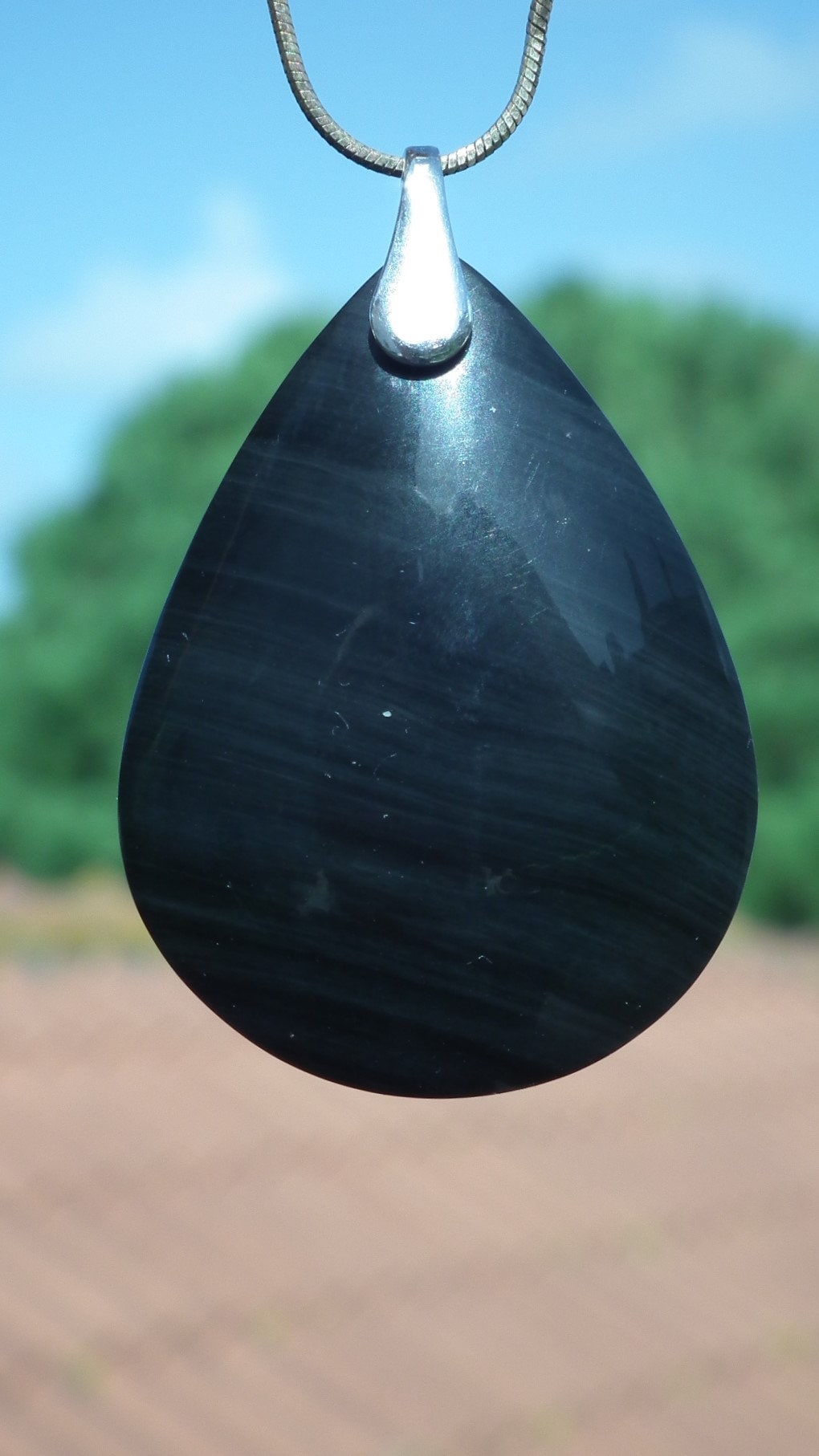 Rainbow obsidian pendant with sterling silver bail