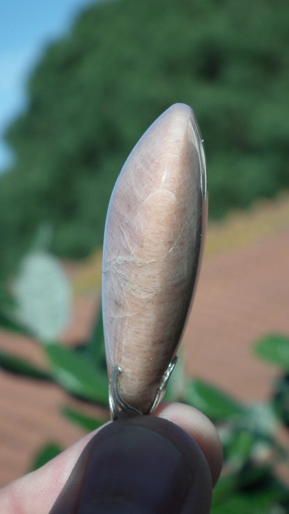 Peach moonstone necklace with silverplated bail