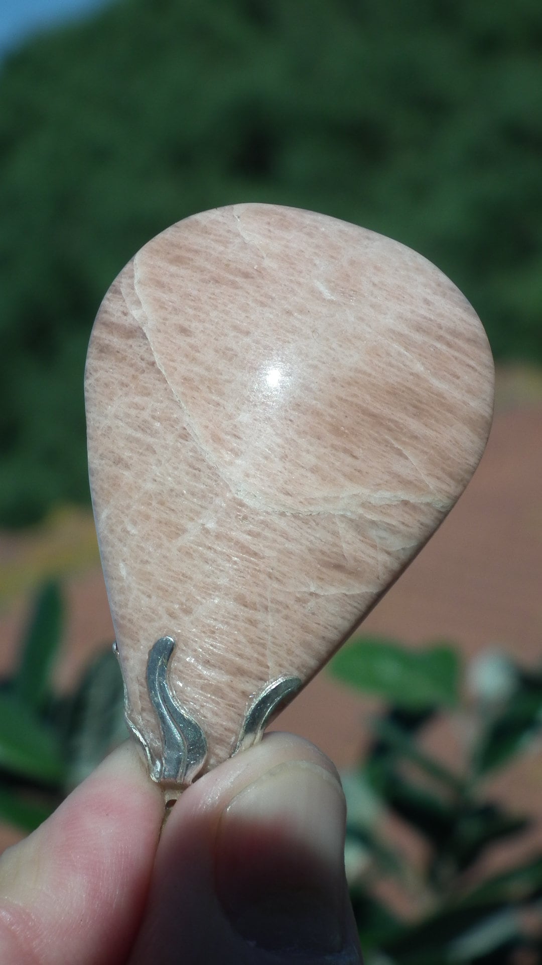 Peach moonstone necklace with silverplated bail